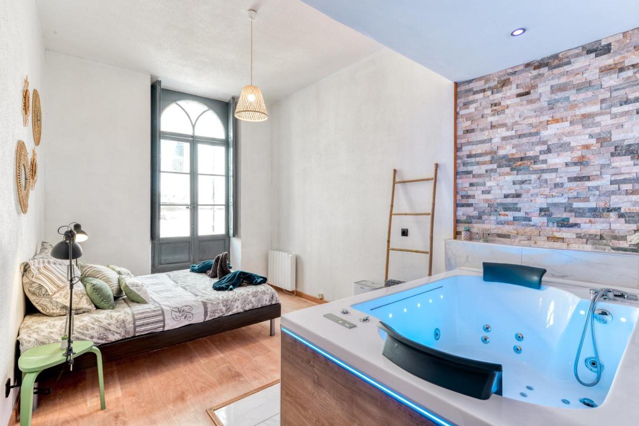 Appartement Parenthèse Occitane -WIFI - Balnéo- Parking Gratuit - Netflix à Carcassonne Extérieur photo